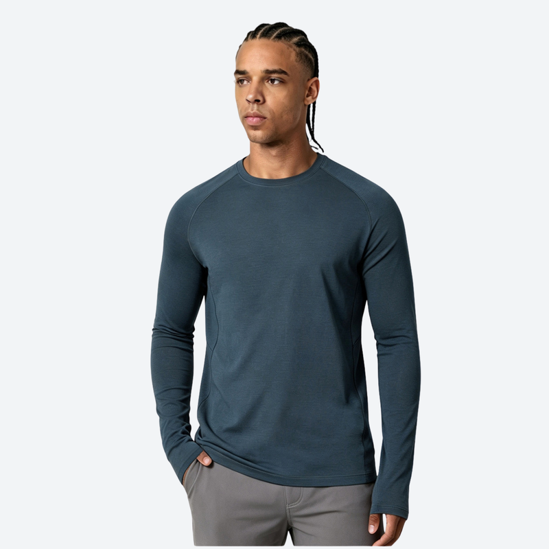 Men's merino wool quick-dry base layer top - navy merino wool quick-dry base layer top on men, for layering in cool weather