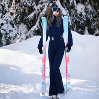 
                  
                    Women's one-piece snowboard suit with waist belt - navy one-piece snow suit, for resort and backcountry days
                  
                