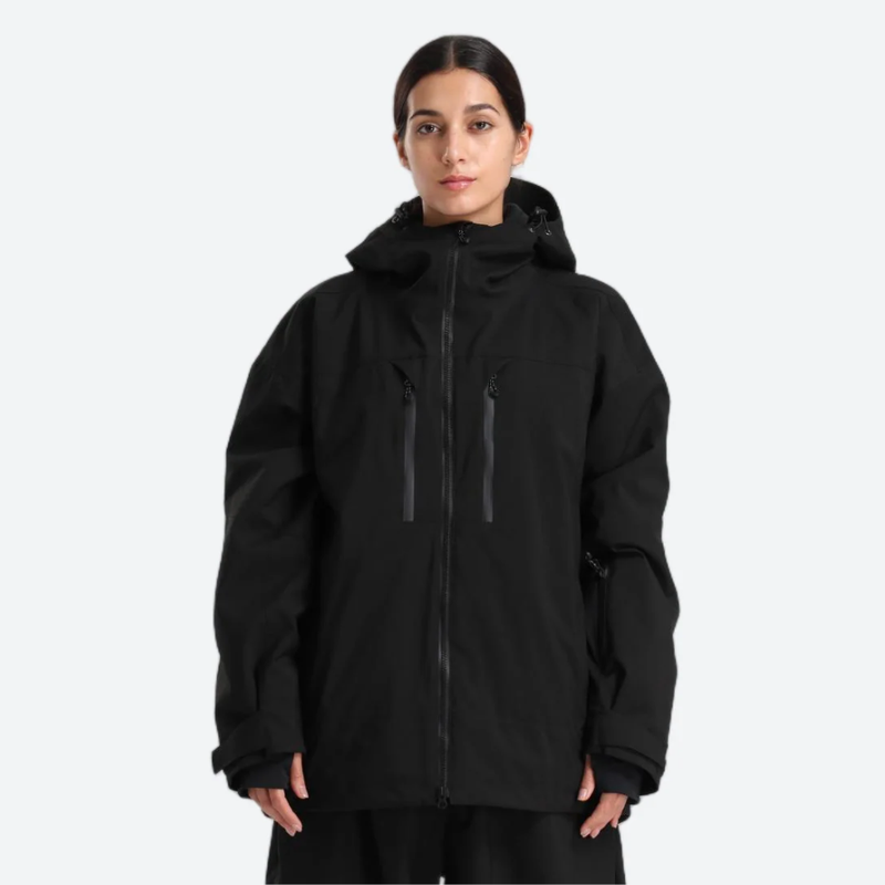 Women's breathable ski jacket with chest zip pockets - black jacket, on-model front view, for resort and street wear