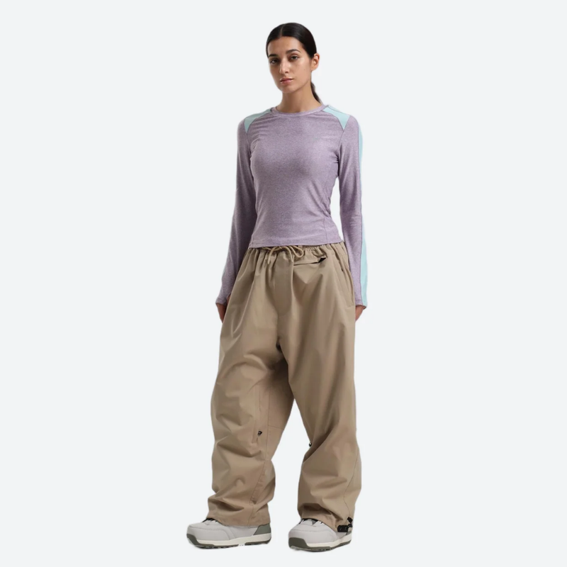 Women's waterproof 2L snow jacket and pants - lavender base layer top with tan snow pants, for skiing and snowboarding