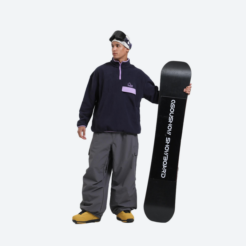 Unisex breathable wide-leg ski pants - gray snow pants, on-model front with upright snowboard, for cold-weather winter sports