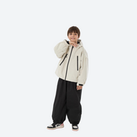 
                  
                    Youth 3-layer ski suit with bib pants - cream jacket with black pants, for cold-weather winter outdoor fun
                  
                