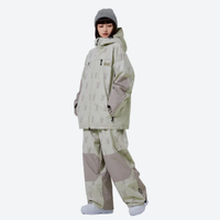 
                  
                    Women's breathable rabbit print ski jacket set - sage green rabbit print jacket with matching pants, on-model side view
                  
                