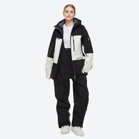 
                  
                    Unisex waterproof 2L snow jacket and bib pants - black and white colorblock, for skiing and snowboarding
                  
                