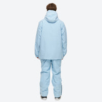 
                  
                    Unisex waterproof 2L snow jacket and bib pants - ice blue jacket with ice blue pants, for cold-weather winter sports
                  
                