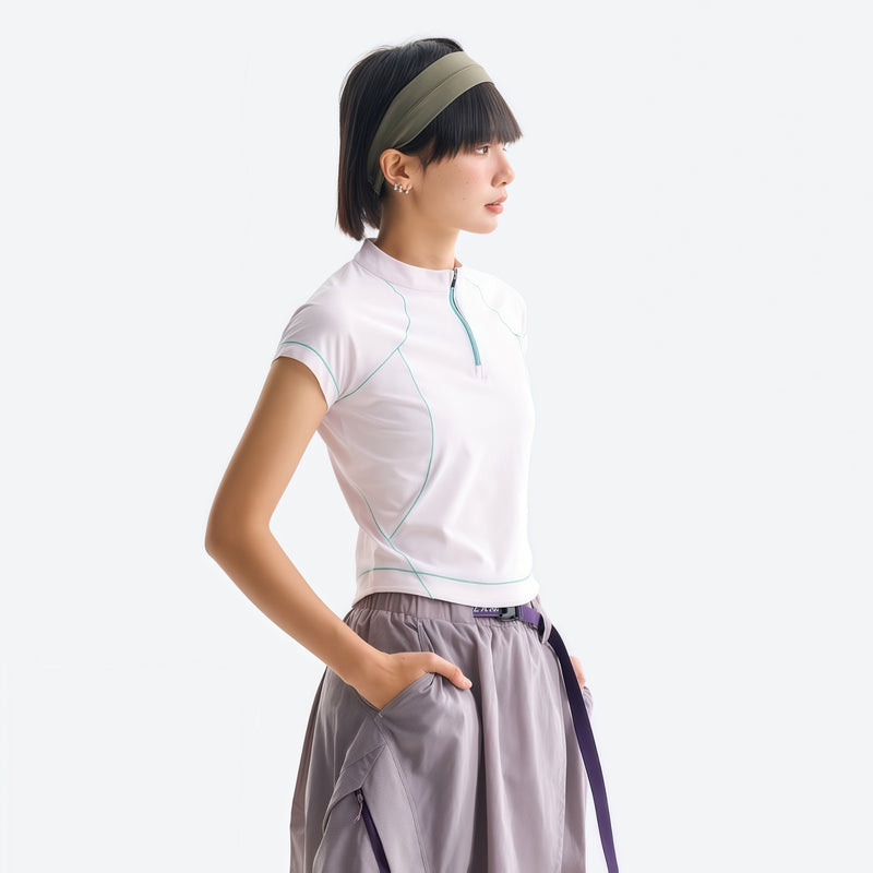 Women's fitted quick-dry breathable tee - white half-zip short sleeve tee on women with headband, for travel and city walks