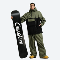 
                  
                    Women's colorblock ski pullover set - olive green and black colorblock jacket with olive pants, high storm collar blocks wind
                  
                