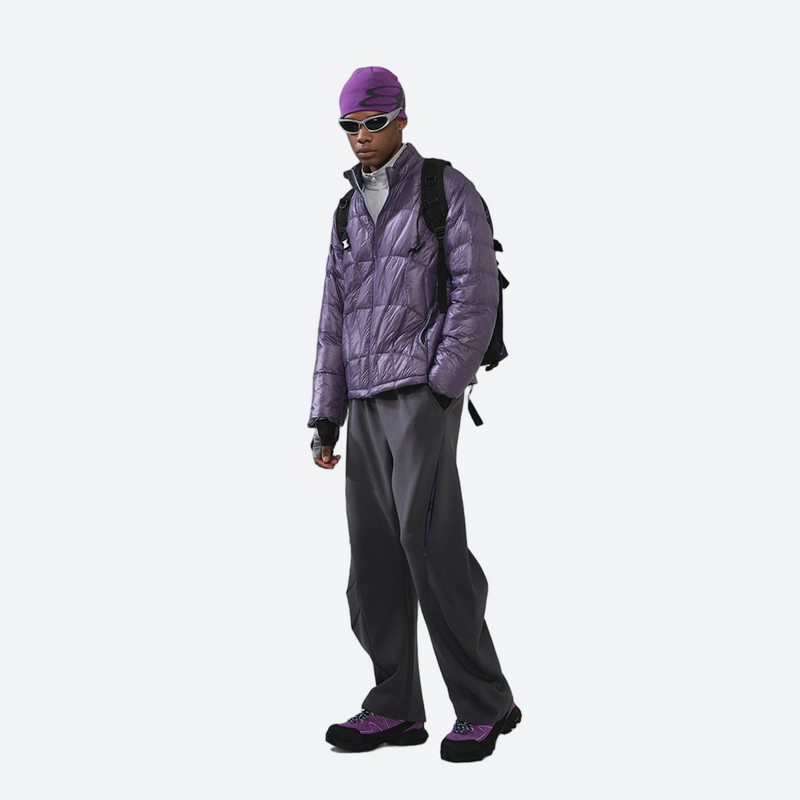 Unisex ultralight packable down vest and jacket - purple ultralight down jacket on men with backpack, walking side view