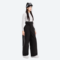 
                  
                    Women's colorblock waterproof snow jacket and pants - black wide-leg snow pants with white top, for skiing and snowboarding
                  
                