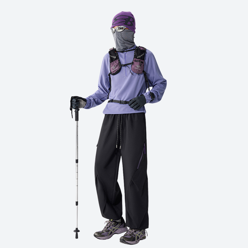 Breathable 650+ fill power duck down snow pants - black down pants with lavender top and face mask, full-body front view