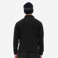 
                  
                    Breathable quick-dry fleece liner for layering - black fleece liner jacket on men with beanie, for travel and daily commute
                  
                