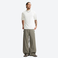 
                  
                    Breathable ripstop trail pants and shorts collection - gray wide-leg pants with white tee, for hiking and trail walking
                  
                