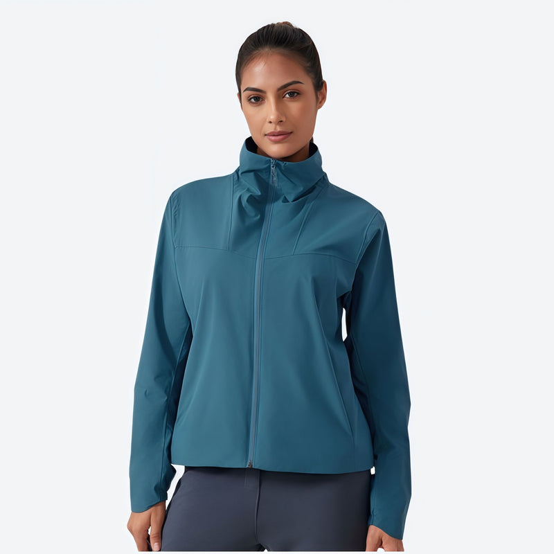 Women's slim fit windproof softshell ski jacket - teal softshell jacket, on-model front view, for hiking and trail walking