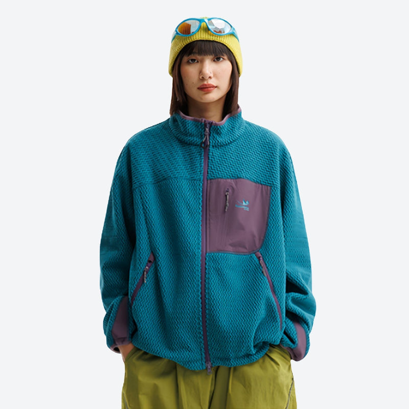 Wavy fleece texture mid-layer jacket - teal wavy fleece mid-layer jacket with purple pocket on women with beanie