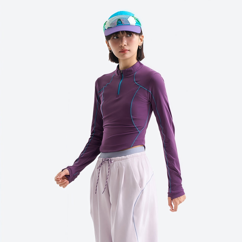 Women's wrinkle-resistant half-zip top - purple half-zip long sleeve tee on women with cap, for travel and city walks