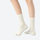 Machine washable merino wool crew socks - cream merino wool socks on feet, standing view, for hiking and trail walking
