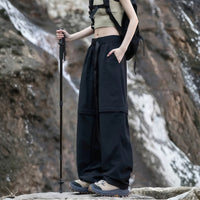 
                  
                    Women's quick-dry trail pants converting to shorts - black zip-off hiking pants with olive top, for hiking and trail walking
                  
                