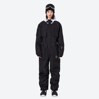 
                  
                    Unisex 2-layer snowboard one-piece suit - black one-piece suit, on-model full-body front view, for cold-weather winter sports
                  
                
