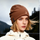 Fine 17.5 micron merino wool beanie - brown merino beanie on women, worn close-up view, for hiking and trail walking