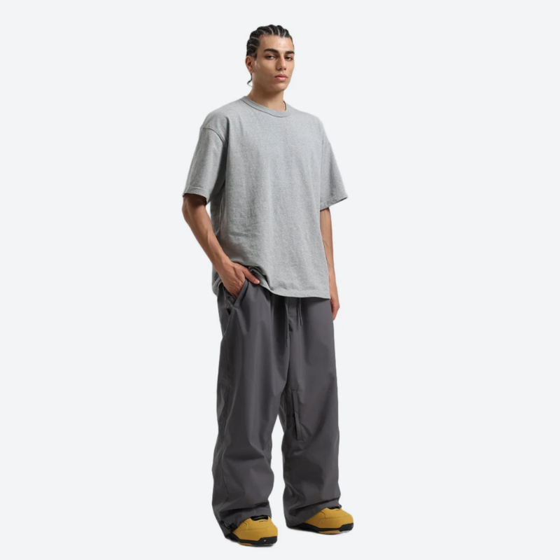 Men's colorblock ski pullover set - gray snow pants, on-model three-quarter front view, for skiing and snowboarding