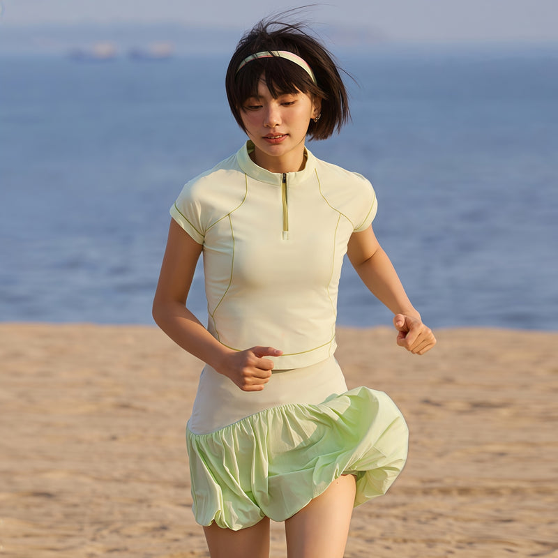 Women's fitted quick-dry breathable tee - lime cream half-zip short sleeve tee on women with headband