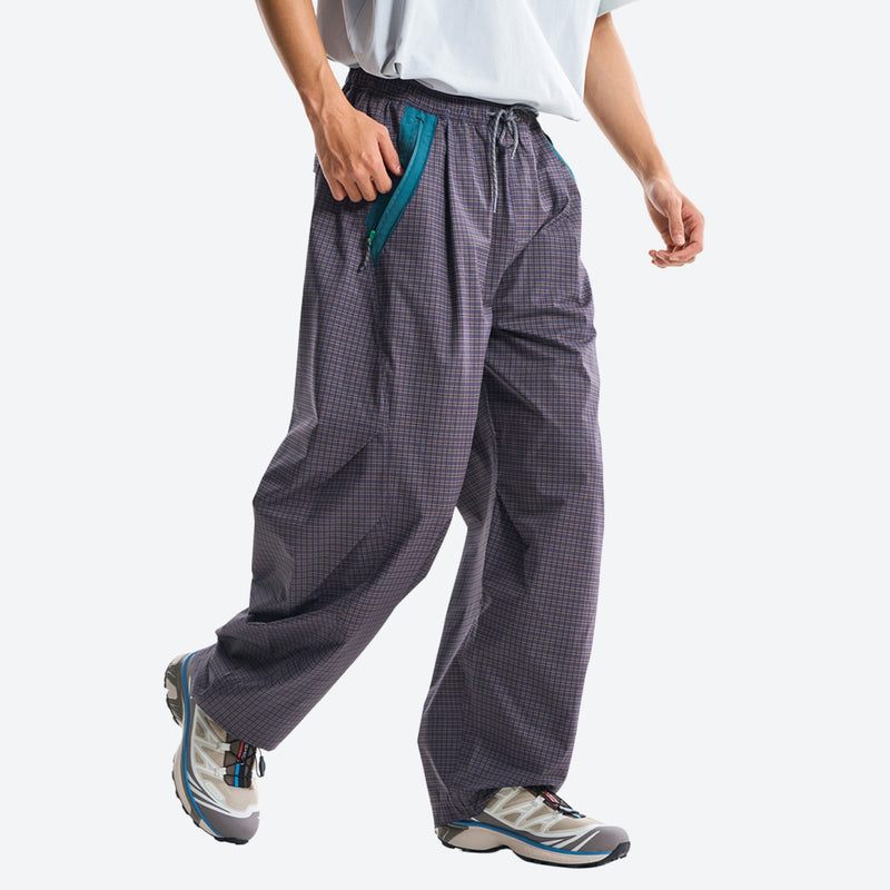 Breathable relaxed trail pants with drawcord waist - dark gray quick-dry hiking pants with blue top, stride walking view