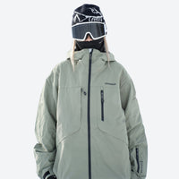 
                  
                    Colorblock snowboard jacket and pants set - sage green, on-model front with goggles on head, for cold-weather winter sports
                  
                