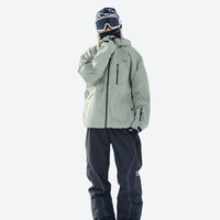 
                  
                    Colorblock snowboard jacket and pants set - sage green jacket with black pants, for resort and backcountry days
                  
                