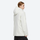Women's 2-layer snowboard jacket and pants - white jacket, on-model side view, for cold-weather winter sports