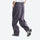 Lightweight water-repellent hiking pants with pockets - dark gray quick-dry hiking pants with blue top, back walking view