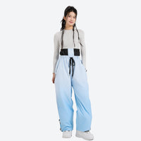 
                  
                    Unisex gradient print snowboard jacket and pants - blue gradient snow pants with black top, for cold-weather winter sports
                  
                