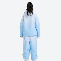 
                  
                    Breathable waterproof 2L ombre ski set - blue gradient jacket with pants, on-model back view, for powder and piste riding
                  
                