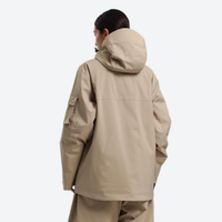 
                  
                    Women's waterproof 2L snow jacket and pants - tan, on-model back hood view, for powder days and winter commute
                  
                