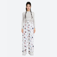
                  
                    Women's print snowboard anorak with wide-leg pants - white print wide-leg pants with gray top, for powder and piste riding
                  
                