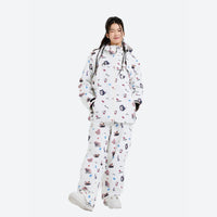 
                  
                    Women's breathable paw print pullover ski jacket - white print anorak with print pants, for powder and piste riding
                  
                