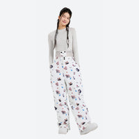 
                  
                    Women's print snowboard anorak with wide-leg pants - white print pants with gray top, for resort and street wear
                  
                