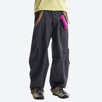 
                  
                    Lightweight water-repellent hiking pants with pockets - dark gray quick-dry hiking pants with yellow top
                  
                