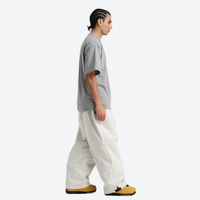 
                  
                    Unisex waterproof 3L snow anorak jacket and pants - white snow pants with gray tee, for resort and street wear
                  
                