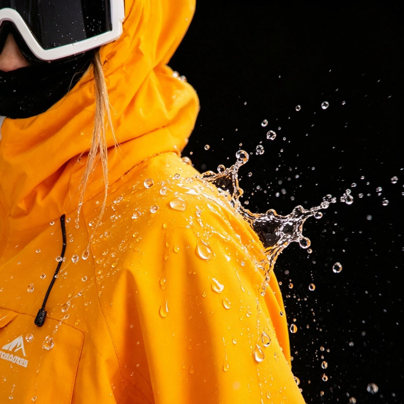 Men's breathable ski jacket and pants set - amber orange, for resort and backcountry days
