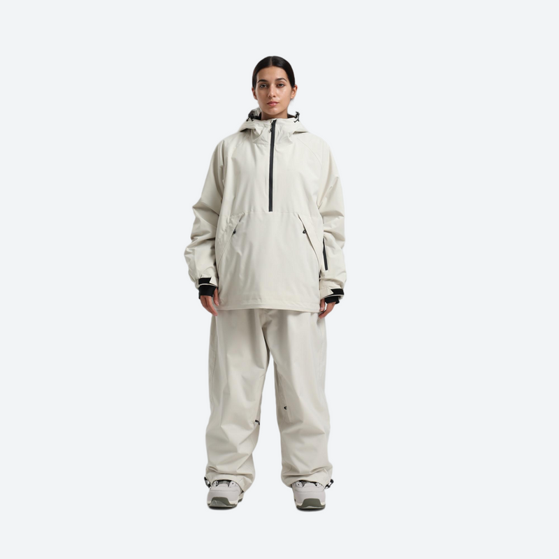 Women's waterproof 2L anorak snow jacket and pants - light gray anorak jacket with white pants, on-model front view