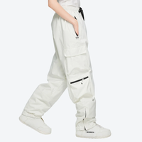 
                  
                    Men's breathable ski jacket with cargo pants - white snow pants, for powder days and winter commute
                  
                