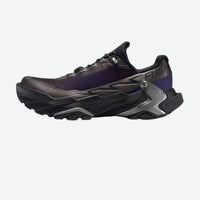 
                  
                    Grippy trail shoes with 4mm multi-directional lugs - dark purple trail shoes with wide forefoot, product side view
                  
                