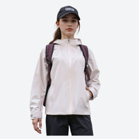 
                  
                    Women's lightweight hardshell rain jacket for trail - cream hardshell jacket, for travel and daily commute
                  
                