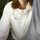 Stain-proof hooded sun jacket for outdoor - cream white waterproof sun jacket, chest logo close-up, for travel and city walks