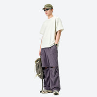 
                  
                    Unisex Coolmax zip-off hiking pants with UPF50 - purple zip-off hiking pants with white tee, UPF50 fabric blocks sun
                  
                
