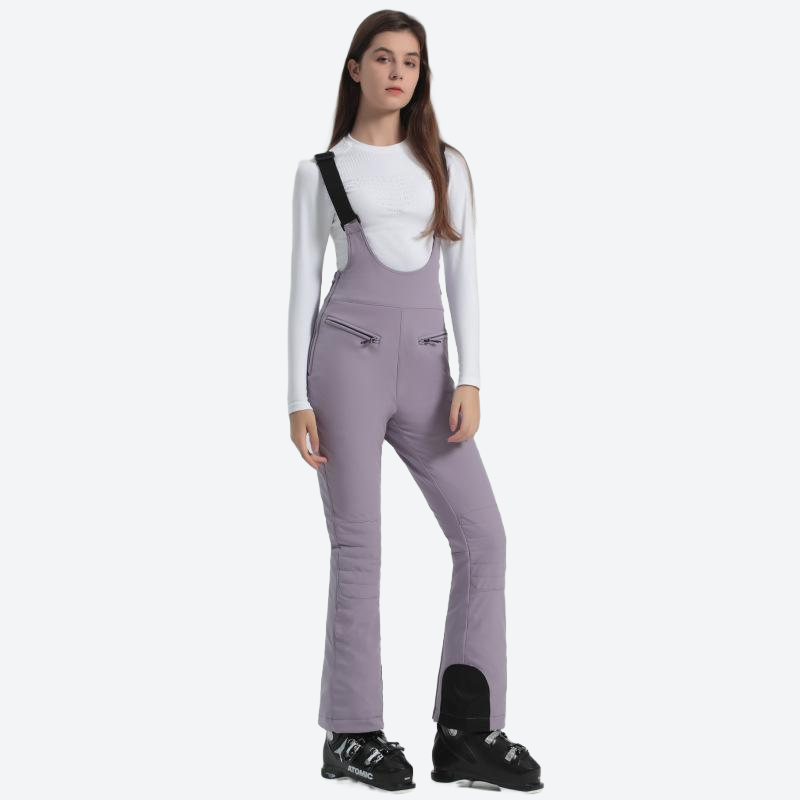 Women's slim fit waterproof ski bib pants - lavender slim fit ski bib, front three-quarter view, for snow sports weekends