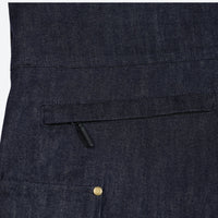 
                  
                    Unisex denim print snowboard bibs with pockets - navy denim, back pocket flap close-up detail, for cold-weather winter sports
                  
                