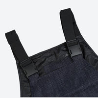 
                  
                    Breathable waterproof jean-style suspender ski pants - navy denim, for cold-weather winter sports
                  
                