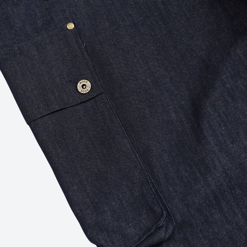 Unisex denim-look bib snow pants - navy denim, cuff snap close-up detail, for skiing and snowboarding