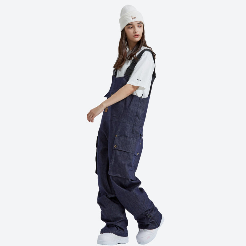 Breathable waterproof jean-style suspender ski pants - navy denim bib snow pants with white tee, for skiing and snowboarding
